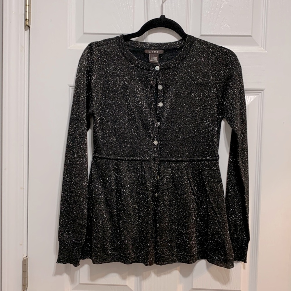 Black sweater with gold sparkle.